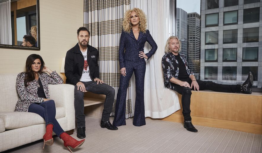 This Jan. 13, 2020 photo shows members of the country group Little Big Town, from left, Karen Fairchild, Jimi Westbrook, Kimberly Schlapman and Phillip Sweet posing for a portrait in New York to promote their new album &amp;quot;Nightfall,&amp;quot; out on Friday.  (Photo by Matt Licari/Invision/AP)
