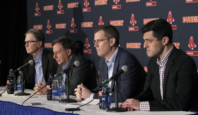 From left, Boston Red Sox owner John Henry, chairman Tom Werner, CEO Sam Kennedy and Chief Baseball Officer Chaim Bloom participate in a baseball news conference at Fenway Park, Wednesday, Jan. 15, 2020, in Boston. The Red Sox have parted ways with manager Alex Cora, with the move coming one day after baseball Commissioner Rob Manfred named him as a ringleader with Houston in the sport's sign-stealing scandal. (AP Photo/Elise Amendola)