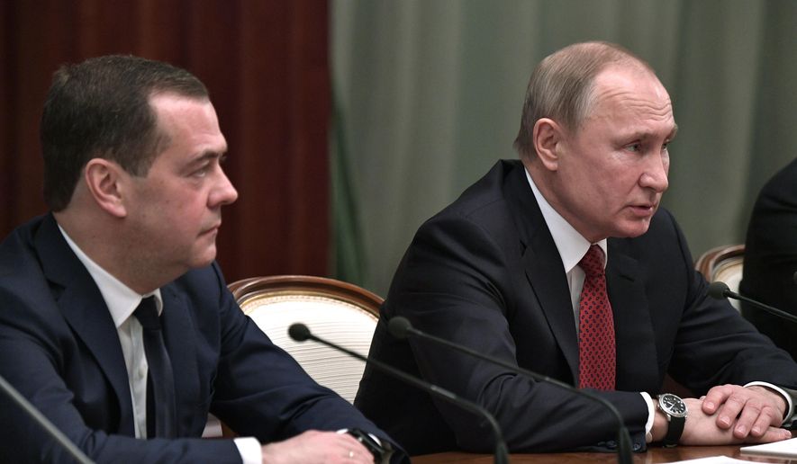 Russian President Vladimir Putin, right, and Russian Prime Minister Dmitry Medvedev attend a cabinet meeting in Moscow, Russia, Wednesday, Jan. 15, 2020. The Tass news agency reports Wednesday that Russian Prime Minister Dmitry Medvedev submitted his resignation to President Vladimir Putin. Russian news agencies said Putin thanked Medvedev for his service but noted that the prime minister&#39;s Cabinet failed to fulfil all the objectives set for it. (Alexei Nikolsky, Sputnik, Kremlin Pool Photo via AP)
