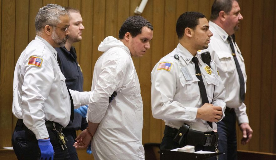 Miguel Rodriguez, who is being charged with abducting an 11-year-old girl, is arraigned in Springfield District Court, Thursday, Jan. 16, 2020, in Springfield, Mass. (Leon Nguyen/The Republican via AP, Pool)