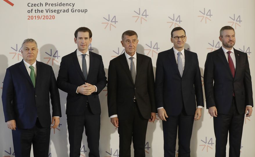 Prime Ministers of Slovakia Peter Pellegrini, right, Poland Mateusz Morawiecki, 2nd right, Czech Republic Andrej Babis, center, Hungary Viktor Orban, left, and Austria's Chancellor Sebastian Kurz, 2nd left, pose for a photo as they meet at the National Museum in Prague, Czech Republic, Thursday, Jan. 16, 2020. (AP Photo/Petr David Josek)
