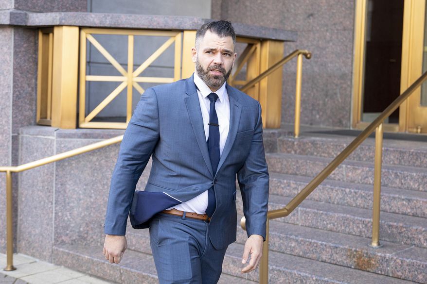 Mark D'Amico exits the Mitchell H. Cohen U.S. Courthouse, Thursday, Jan. 16, 2020, after his hearing in Camden, N.J. D'Amico, who has already pleaded guilty in state court to participating in an online donation fraud scheme was indicted Wednesday on federak charges of conspiracy, wire fraud and money laundering. The 40-year-old Bordentown resident already faces a five-year term in state prison. (Tyger Williams/The Philadelphia Inquirer via AP)