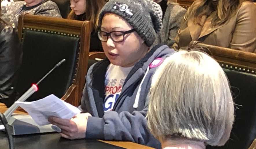 Jordanne Beach, of Urbandale, Iowa, speaks before a Senate subcommittee at the Iowa Capitol on Thursday, Jan. 16, 2020, in Des Moines, Iowa. She opposed a constitutional amendment that would declare there is no right to an abortion under the Iowa Constitution. (AP Photo/David Pitt)