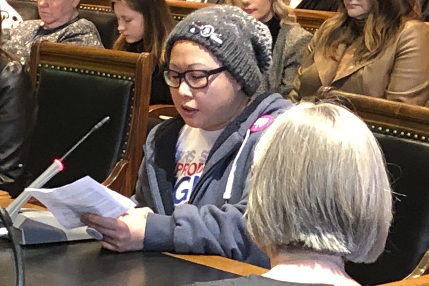 Jordanne Beach, of Urbandale, Iowa, speaks before a Senate subcommittee at the Iowa Capitol on Thursday, Jan. 16, 2020, in Des Moines, Iowa. She opposed a constitutional amendment that would declare there is no right to an abortion under the Iowa Constitution. (AP Photo/David Pitt)