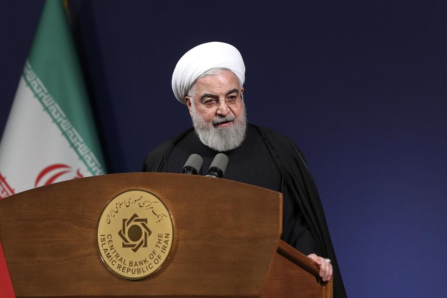 In this photo released by the official website of the office of the Iranian Presidency, President Hassan Rouhani speeches before the heads of banks, in Tehran, Iran, Thursday, Jan. 16, 2020. Iran's president said Thursday that there is "no limit" to the country's enrichment of uranium following its decision to abandon its commitments under the 2015 nuclear deal in response to the killing of its top general in a U.S. airstrike. (Office of the Iranian Presidency via AP)