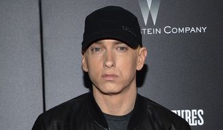 In this July 20, 2015, file photo, rapper Eminem attends the premiere of &quot;Southpaw&quot; in New York. Rapper Eminem once again dropped a surprise album, releasing “Music to be Murdered By” on Friday, Jan. 17, 2020. (Photo by Evan Agostini/Invision/AP, File)