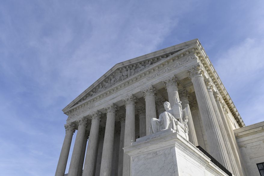 In this Nov. 11, 2019, photo, a view of the Supreme Court in Washington. The Supreme Court will decide whether Electoral College voters are required to support presidential candidate who wins their state. (AP Photo/Susan Walsh) **FILE**