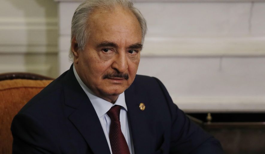 Libyan Gen. Khalifa Hifter joins a meeting with the Greek Foreign Minister Nikos Dendias in Athens, Friday, Jan. 17, 2020. The commander of anti-government forces in war-torn Libya has begun meetings in Athens in a bid to counter Turkey&#39;s support for his opponents. (AP Photo/Thanassis Stavrakis)