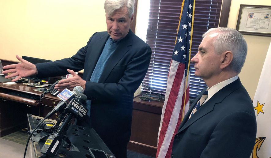U.S. Sens. Sheldon Whitehouse, left, and Jack Reed discuss the impeachment trial of President Donald Trump Friday, Jan. 17, 2020, at Reed&#39;s office in Cranston, R.I. The Rhode Island Democrats spoke about the importance of calling witnesses for the trial. (AP Photo/Jennifer McDermott)