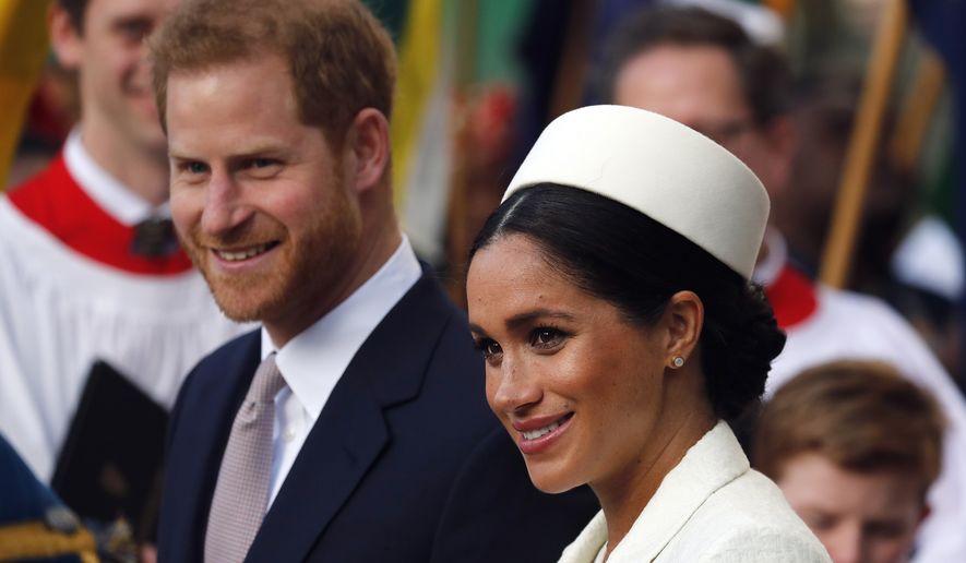 FILE - In this Monday, March 11, 2019 file photo, Britain&#x27;s Prince Harry and Meghan, the Duchess of Sussex leave after the Commonwealth Service at Westminster Abbey in London. Prince Harry and Meghan Markle are to no longer use their HRH titles and will repay £2.4 million of taxpayer&#x27;s money spent on renovating their Berkshire home, Buckingham Palace announced Saturday, Jan. 18. 2020. (AP Photo/Frank Augstein, file)