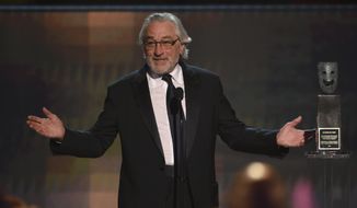Robert De Niro accept the lifetime achievement award at the 26th annual Screen Actors Guild Awards at the Shrine Auditorium &amp; Expo Hall on Sunday, Jan. 19, 2020, in Los Angeles. (Photo/Chris Pizzello)