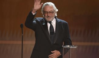 Robert De Niro accepts the lifetime achievement award at the 26th annual Screen Actors Guild Awards at the Shrine Auditorium &amp;amp; Expo Hall on Sunday, Jan. 19, 2020, in Los Angeles. (Photo/Chris Pizzello)
