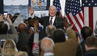 Democratic presidential candidate Michael Bloomberg waves to the crowd at the conclusion of his speech at the Greenwood Cultural Center in Tulsa, Okla., Sunday, Jan. 19, 2020. (AP Photo/Sue Ogrocki)