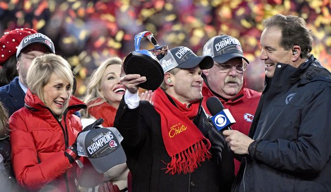 Norma Hunt, left, and her son Clark Hunt, center, owners of the Kansas City Chiefs, and Kansas City Chiefs head coach Andy Reid, second right, celebrate after the NFL AFC Championship football game against the Tennessee Titans Sunday, Jan. 19, 2020, in Kansas City, MO. The Chiefs won 35-24 to advance to Super Bowl 54. (AP Photo/Jeff Roberson)