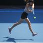 Russia&#39;s Maria Sharapova hits a backhand return during a practice session ahead of the Australian Open tennis championship in Melbourne, Australia, Sunday, Jan. 19, 2020. (AP Photo/Andy Wong)