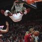 Rutgers guard Montez Mathis (23) hangs on the rim after this slam dunk during the first half of an NCAA college basketball game against Indiana, Wednesday, Jan. 15, 2020 in Piscataway, N.J. (Andrew Mills/NJ Advance Media via AP)