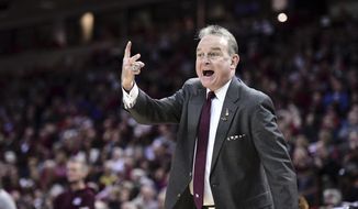 Mississippi State coach Vic Schaefer shouts at an official during the first half of an NCAA college basketball game against South Carolina Monday, Jan. 20, 2020, in Columbia, S.C. (AP Photo/Sean Rayford)