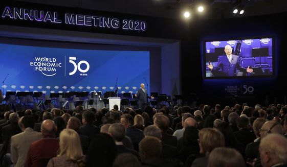 Klaus Schwab, founder of the World Economic Forum, delivers a welcome message on the eve of the annual meeting of the World Forum in Davos, Switzerland, Monday, Jan. 20, 2020. The 50th annual meeting of the forum will take place in Davos from Jan. 21 until Jan. 24, 2020. (AP Photo/Markus Schreiber)