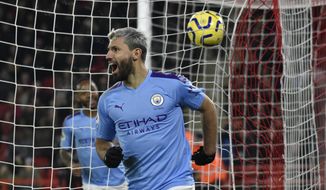 Manchester City&#39;s Sergio Aguero celebrates after scoring his side&#39;s opening goal during the English Premier League soccer match between Sheffield United and Manchester City at Bramall Lane in Sheffield, England, Tuesday, Jan. 21, 2020. (AP Photo/Rui Vieira)