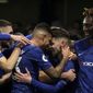 Chelsea&#39;s Jorginho, second right, celebrates with teammates after scoring his side&#39;s opening goal from the penalty spot during the English Premier League soccer match between Chelsea and Arsenal at Stamford Bridge Stadium in London, Tuesday, Jan. 21, 2020. (AP Photo/Matt Dunham)