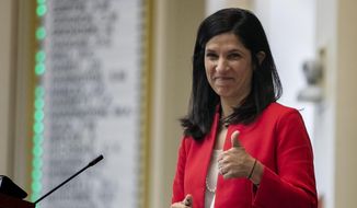 In this Jan. 8, 2020, file photo, House Speaker Sara Gideon, D-Freeport, flashes a thumbs up at a Democratic colleague prior to the start of the first session of the new year at the State House House in Augusta, Maine. Planned Parenthood announced Tuesday that it is endorsing Gideon, a Democratic challenger to Republican Sen. Susan Collins in Maine, saying Collins “turned her back” on women and citing her vote to confirm Brett Kavanaugh to the Supreme Court as well as other judicial nominees who oppose abortion.  (AP Photo/Robert F. Bukaty)
