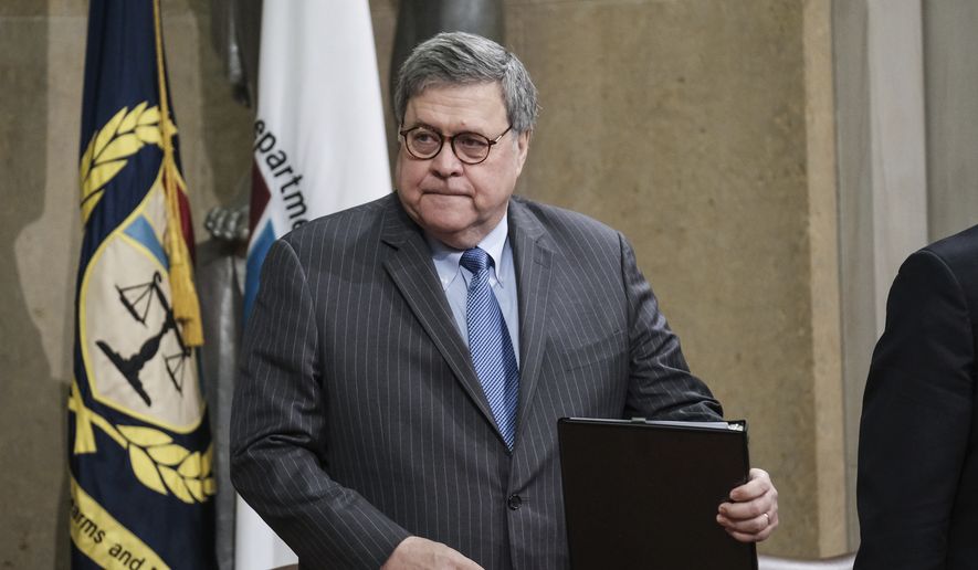 Attorney General William Barr arrives for an ceremony at the Department of Justice, Wednesday, Jan. 22, 2020, in Washington, to announce the establishment of the Presidential Commission on Law Enforcement and the Administration of Justice, and its commissioners. (AP Photo/Michael A. McCoy)