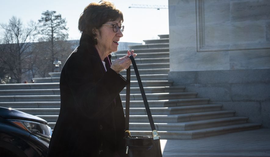 Sen. Susan Collins, R-Maine, arrives a the Capitol in Washington, Wednesday, Jan. 22, 2020. The U.S. Senate was poised to hear opening arguments Wednesday in President Donald Trump’s impeachment trial, with Democratic House managers set to make their case that Trump abused power and should be removed from office. (AP Photo/Cliff Owen)