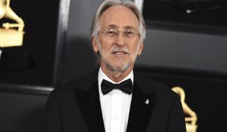 FILE - This Feb. 10, 2019 file photo shows then President and CEO of The Recording Academy Neil Portnow at the 61st annual Grammy Awards in Los Angeles. Portnow says a rape allegation against him aired in a complaint against the Recording Academy by his successor is “false and outrageous.” Portnow released a statement saying the academy during his tenure had conducted a thorough and independent investigation and he was “completely exonerated.” (Photo by Jordan Strauss/Invision/AP, File)