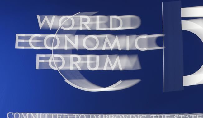 The World Economic Forum logo is seen in Davos, Switzerland, Tuesday, Jan. 21, 2020. The 50th annual meeting of the forum will take place in Davos from Jan. 21 until Jan. 24, 2020. (AP Photo/Michael Probst)