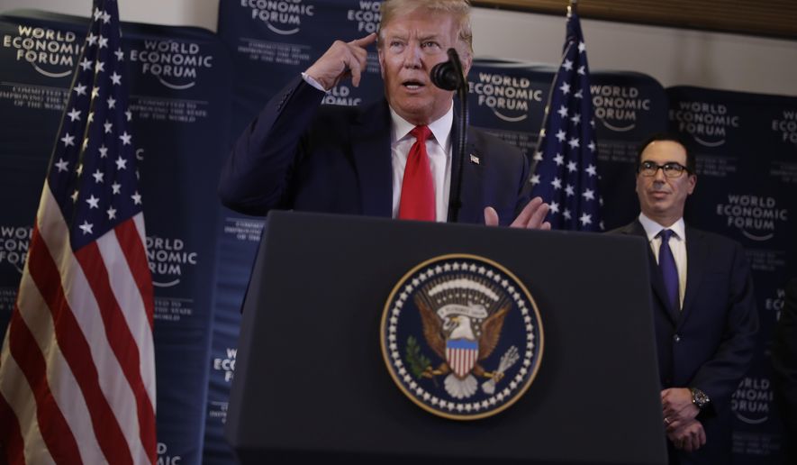 US President Donald Trump speaks during a news conference at the World Economic Forum in Davos, Switzerland, Wednesday, Jan. 22, 2020. Trump&#x27;s two-day stay in Davos is a test of his ability to balance anger over being impeached with a desire to project leadership on the world stage. (AP Photo/Evan Vucci)