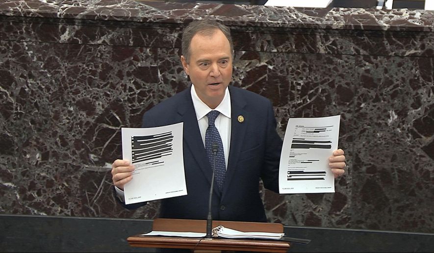 In this image from video, House impeachment manager Rep. Adam Schiff, D-Calif., holds redacted documents as he speaks during the impeachment trial against President Donald Trump in the Senate at the U.S. Capitol in Washington, Wednesday, Jan. 22, 2020. (Senate Television via AP)