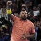 Australia&#39;s Nick Kyrgios celebrates after defeating France&#39;s Gilles Simon in their second round singles match at the Australian Open tennis championship in Melbourne, Australia, Thursday, Jan. 23, 2020. (AP Photo/Lee Jin-man)
