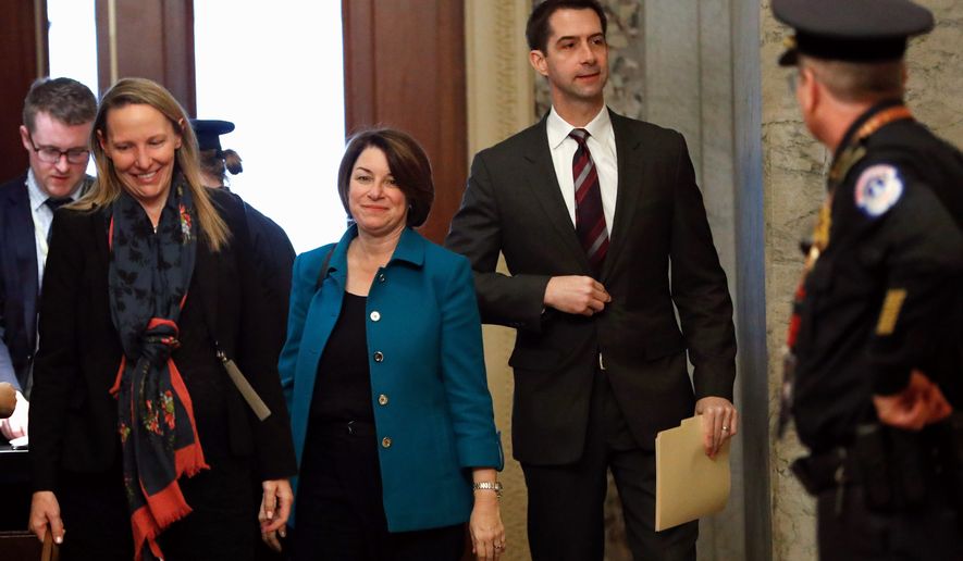 Sen. Tom Cotton took a jab at Rep. Adam B. Schiff and the chamber rules for senators during the President Trump’s impeachment trial by tweeting that he could’ve added vodka to his milk and chocolate to create a “White Russian” drink. (Associated Press photograph)