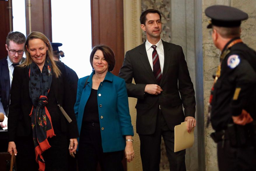 Sen. Tom Cotton took a jab at Rep. Adam B. Schiff and the chamber rules for senators during the President Trump’s impeachment trial by tweeting that he could’ve added vodka to his milk and chocolate to create a “White Russian” drink. (Associated Press photograph)