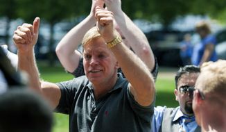 In an Aug. 12, 2017, photo, David Duke arrives to give remarks after a white nationalist protest was declared an unlawful assembly, in Charlottesville, Va. (Shaban Athuman/Richmond Times-Dispatch via AP) **FILE**