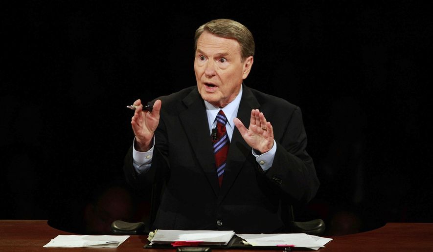 This Sept. 26, 2008, file photo shows debate moderator Jim Lehrer during the first U.S. Presidential Debate between presidential nominees Sen. John McCain, R-Ariz., and Sen. Barack Obama, D-Ill., at the University of Mississippi in Oxford, Miss. PBS announced that PBS NewsHour&#39;s Jim Lehrer died Thursday, Jan. 23, 2020, at home. He was 85. (AP Photo/Chip Somodevilla, File)