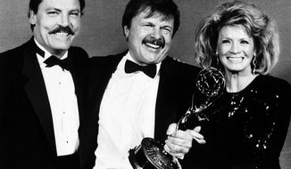 FILE - This Sept. 21, 1986 file photo shows actor John Karlen, center, who portrays the husband of detective Mary Beth Lacey on the TV show &amp;quot;Cagney &amp;amp; Lacey, &amp;quot; posing with presenters Stacy Keach, left, and Angie Dickinson after Karlen won an Emmy for best supporting actor at the Emmy Awards in Pasadena, Calif.  Karlen, known for his roles on the television series “Dark Shadows” and &amp;quot;Cagney &amp;amp; Lacey,&amp;quot; died Wednesday, Jan. 22, 2020, of congestive heart failure in Burbank, Calif. He was 86. (AP Photo/Douglas C. Pizac, File)