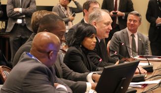 In this file photo, Montgomery County Executive Marc Elrich, second from right, and Prince George&#39;s County Executive Angela D. Alsbrooks, third from right, are shown testifying in a state legislative hearing on Thursday, Jan. 23, 2020, in Annapolis, Md. (AP Photo/Brian Witte) ** FILE **