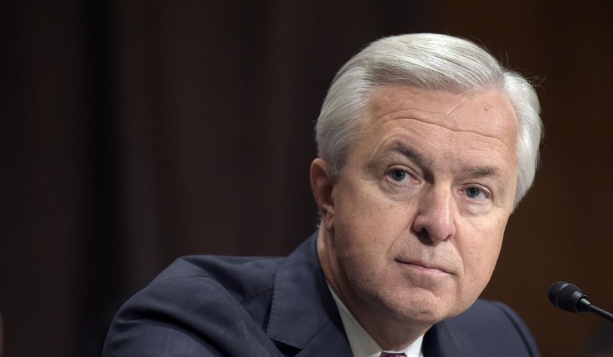 In this Sept. 20, 2016, file photo, Wells Fargo CEO John Stumpf testifies on Capitol Hill in Washington, before the Senate Banking Committee. Federal regulators have slapped former Wells Fargo Chief Executive Stumpf with a $17.5 million fine for his role in the bank&#39;s sales practices scandal. (AP Photo/Susan Walsh, File)