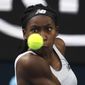 Coco Gauff of the U.S. makes a backhand return to Japan&#39;s Naomi Osaka during their third round singles match at the Australian Open tennis championship in Melbourne, Australia, Friday, Jan. 24, 2020. (AP Photo/Lee Jin-man)