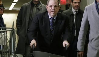 Harvey Weinstein arrives at court for his rape trial, in New York, Friday, Jan. 24, 2020. (AP Photo/Richard Drew)