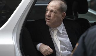 Harvey Weinstein gets into a vehicle as he leaves the courthouse following the second day of his rape trial, Thursday, Jan. 23, 2020, in New York. (AP Photo/Mark Lennihan)