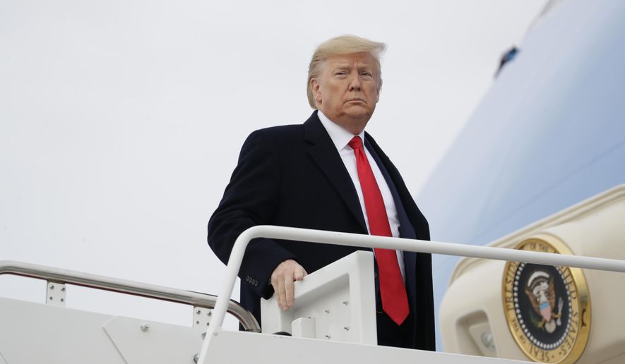 President Donald Trump boards Air Force One for a trip to Miami to attend the Republican National Committee winter meetings, Thursday, Jan. 23, 2020, in Andrews Air Force Base, Md. (AP Photo/ Evan Vucci)