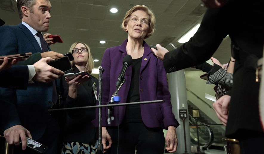 Democratic Presidential candidate Sen. Elizabeth Warren, D-Mass., speaks to the media before attending the impeachment trial of President Donald Trump on charges of abuse of power and obstruction of Congress, Thursday, Jan. 23, 2020, on Capitol Hill in Washington. (AP Photo/ Jacquelyn Martin)
