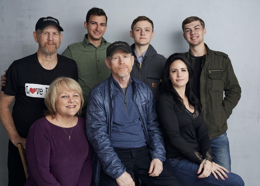 Steve (Woody) Culleton, from left, Bryson Groh, Zach Boston, Brandon Burke, Michelle John, from bottom right, director Ron Howard and Carly Jean Ingersoll pose for a portrait to promote the film &amp;quot;Rebuilding Paradise&amp;quot; at the Music Lodge during the Sundance Film Festival on Friday, Jan. 24, 2020, in Park City, Utah. (Photo by Taylor Jewell/Invision/AP)