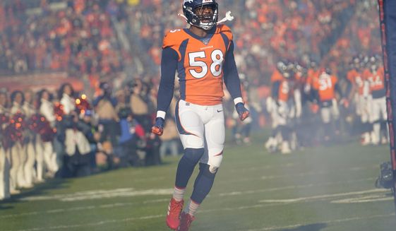 FILE - In this Dec. 29, 2019 file photo, Denver Broncos outside linebacker Von Miller reacts before an NFL football game against the Oakland Raiders in Denver.  Miller&#39;s read on the Super Bowl is this: Patrick Mahomes and the Kansas City Chiefs will be a handful. The Broncos Pro Bowl pass rusher knows that from first-hand experience. But he&#39;s predicting a San Francisco 49ers win.(AP Photo/Jack Dempsey)