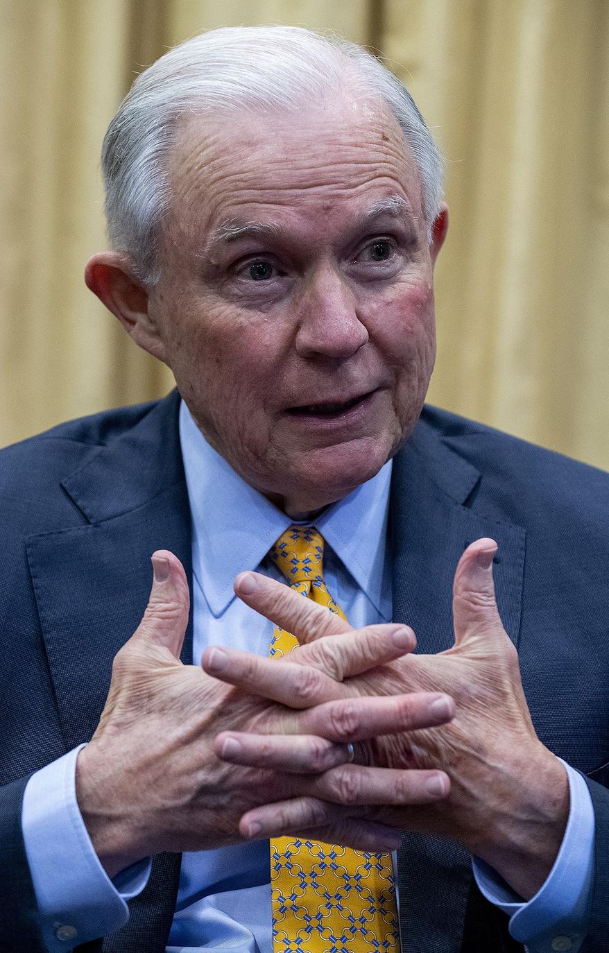 In this Jan. 12, 2020, photo, former Senator and Attorney General Jeff Sessions talks with the Montgomery Advertiser while campaigning for the U.S. Senate seat in Montgomery, Ala. Sessions is part of a crowded GOP primary field competing to challenge U.S. Sen. Doug Jones. (Mickey Welsh/Montgomery Advertiser via AP)
