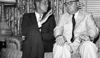 FILE - In this July 10, 1960, file photo, Sen. John F. Kennedy of Massachusetts gestures during his meeting with California Gov. Edmund G. (Pat) Brown in Los Angeles. Former California Gov. Jerry Brown wants to know who is trying to sell his father&#39;s memorabilia related to the assassination of President John F. Kennedy. Private letters and other items that had belonged to Edmund G. &amp;quot;Pat&amp;quot; Brown when he was California governor are being offered by the auction house Sotheby&#39;s, which estimates the value at $20,000 to $30,000.   (AP Photo, File)
