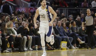 Indiana Pacers forward Doug McDermott (20) reacts after shooting a 3-point basket against the Golden State Warriors during the second half of an NBA basketball game in San Francisco, Friday, Jan. 24, 2020. (AP Photo/Jeff Chiu)