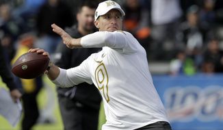 NFC quarterback Drew Brees, of the New Orleans Saints, throws a pass during a practice for the NFL Pro Bowl football game Wednesday, Jan. 22, 2020, in Kissimmee, Fla. (AP Photo/Chris O&#39;Meara)